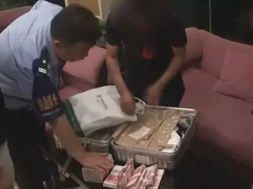 [ 中國 ] 高鐵乘客擺烏龍 裝10萬現金行李箱失而復得