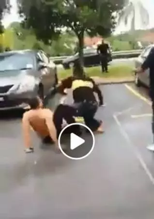 吉隆坡:警方逮捕阻礙拖車男子,證實:是公務員,非警察!