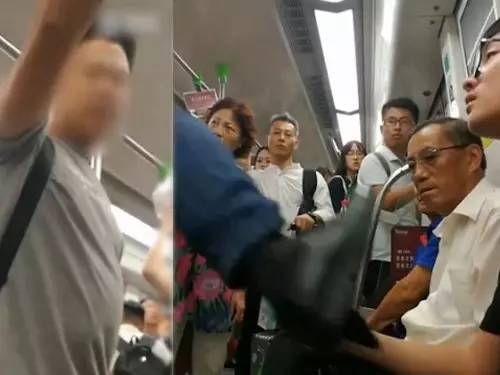 年輕人地鐵上不讓座 憤怒大叔 飛腳教訓