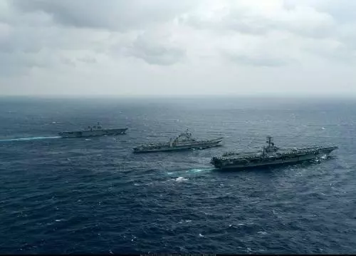 糾集數國在南海大搞軍演 軍迷熱議:中國又將如何驅逐?
