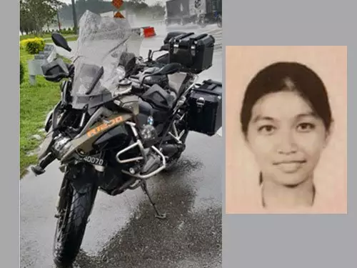 雨天路滑撞分界堤 新加坡騎士 妻死夫傷