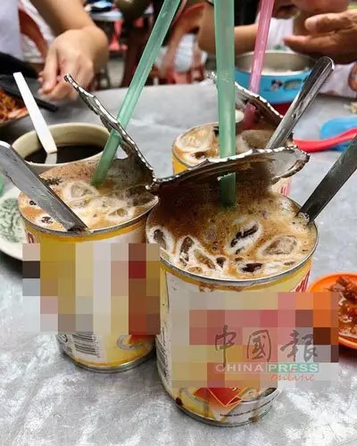 斑點實為咖啡粉!爆紅煉乳罐咖啡店東主喊冤