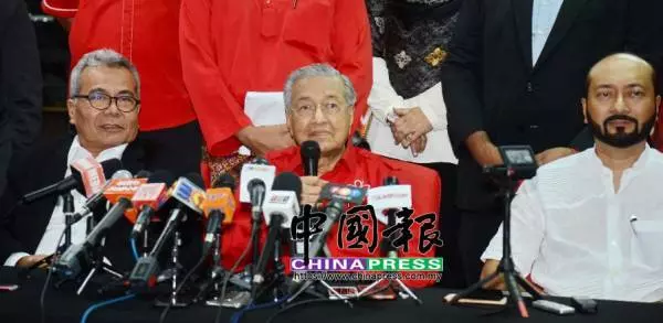首相:現須償還國債 「非調高最低薪金時機」