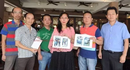 華裔婦女車輪被鎖,毆打官員並開口~~你要我爆你的頭還是你的車?