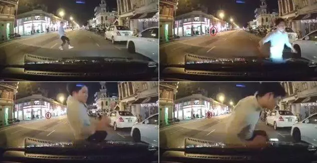 新加坡男子竟這樣「玩命」攔車!差點就被撞飛 !