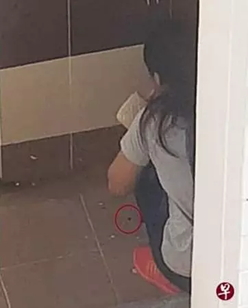 【新加坡】 年輕女郎疑遭人暴打 滿口鮮血還一臉瘀青 蹲組屋底層哭泣 !