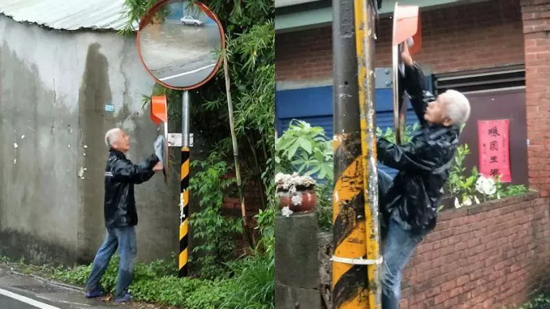 新竹大暴雨!巷內見阿伯爬牆「擦反光鏡」:看不到危險