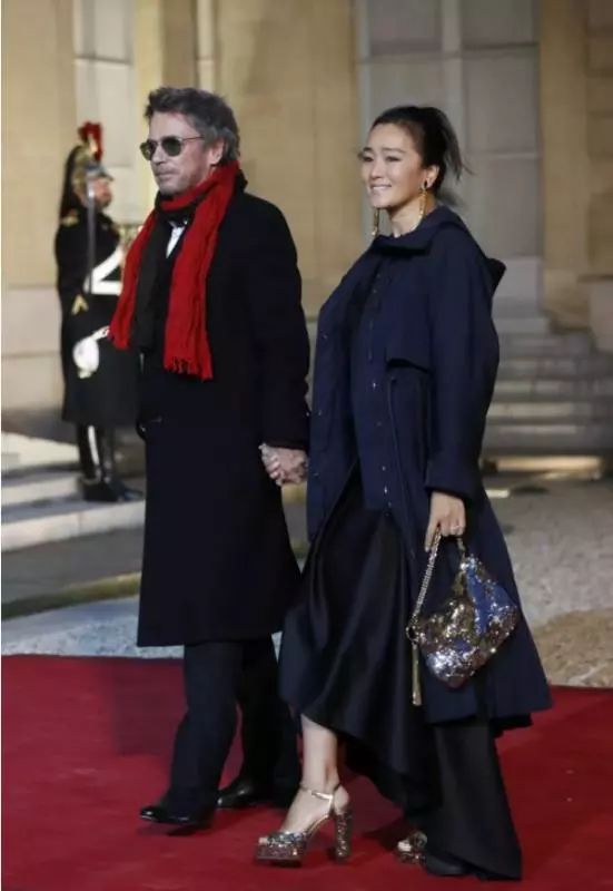 入新加坡籍的鞏俐再嫁71歲世界音樂大師,她換完國籍換老公 !