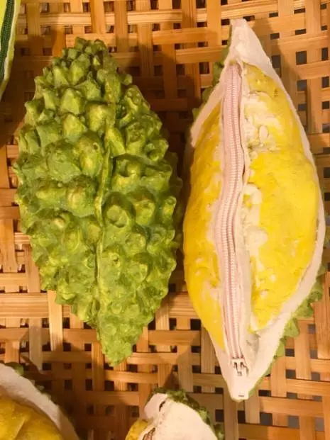史上最有味道的錢包! 泰國必敗「仿真榴槤包」引萬人瘋買:背起來真香~