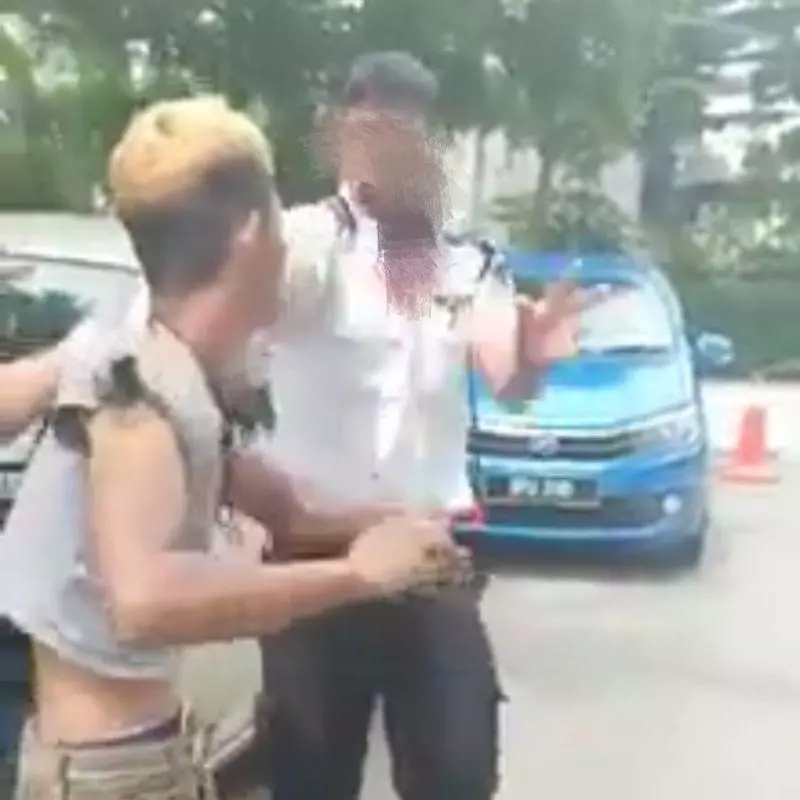 車停OKU不爽被鎖對保安人員發難 , 男子遭警抓進去了 !